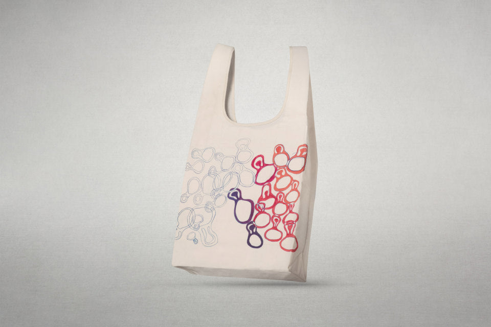 Vibrant Washi paper bag from the Wildling Shoes x Ruth Asawa collaboration with an exclusive artist design.